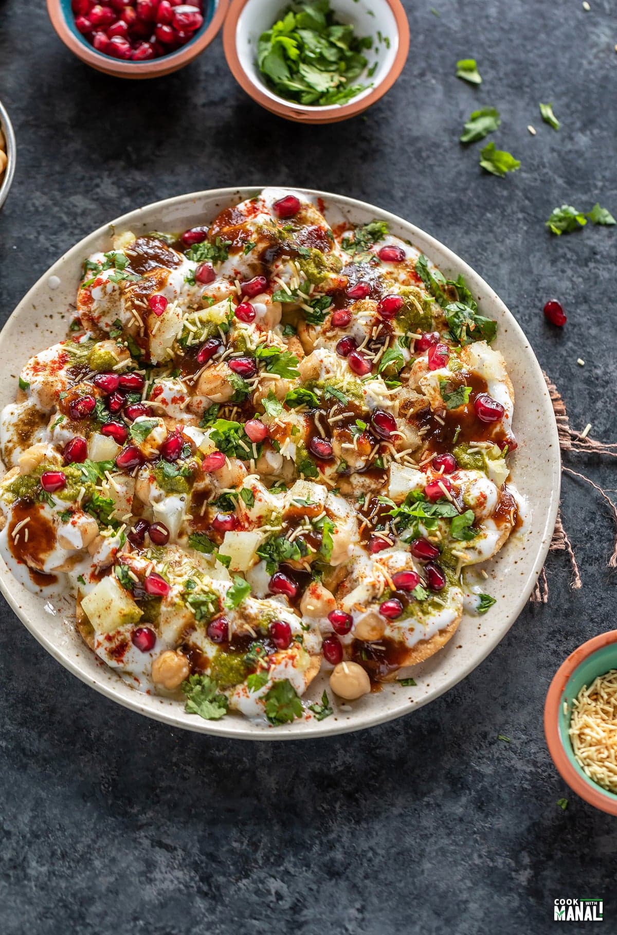 Papdi chaat — crispy wafers, yogurt, chutneys, and toppings